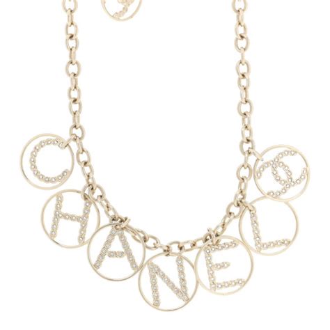 chanel metal strass crystal logo necklace gold tarocca|Necklace Metal, Glass Pearls & Strass Gold, Pearly White & Crystal.